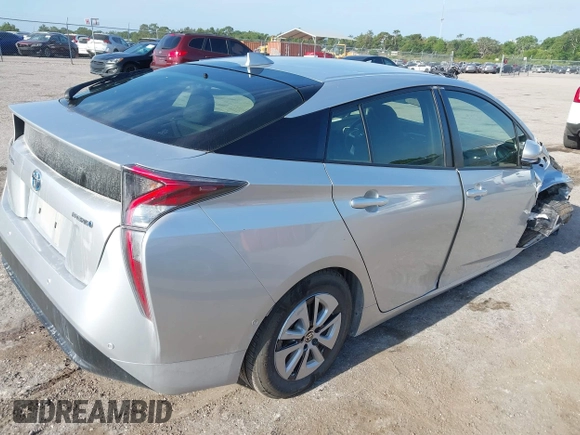 2017 Toyota Prius Two z VIN JTDKARFU8H3046058, wystawiony jako IAAI lot #42169692 z przebiegiem 79 226 mil mil oraz . Historia ofert i sprzedaży dostępna na DreamBid. Obrazek 4.