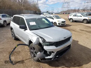 2023 Jeep Grand Cherokee Laredo with VIN 1C4RJHAG2PC660418, listed as a IAAI auction lot 41693879 with 4,295 mi miles and . Bid and sale history available at DreamBid. Image 18.