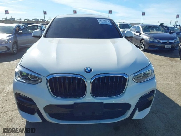 2021 BMW X4 xDrive30i with VIN 5UX2V1C0XM9E90574, listed as a IAAI auction lot 41422478 with NaN miles. Bid and sale history available at carsss.com. Image 12.