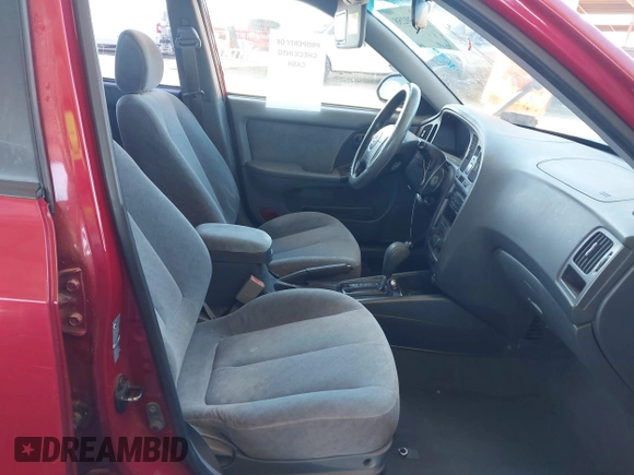 2006 Hyundai Elantra GLS z VIN KMHDN46D56U300313, wystawiony jako IAAI lot #42139258 z przebiegiem 128 623 mil mil oraz . Historia ofert i sprzedaży dostępna na DreamBid. Obrazek 5.