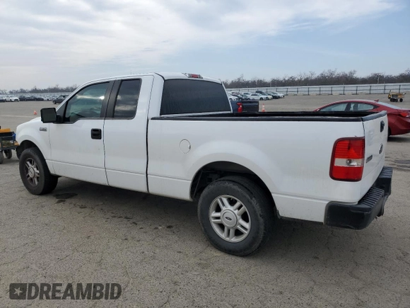 2007 Ford F-150 XL with VIN 1FTPX12557NA26440, listed as a Copart auction lot 41621445 with 184,854 mi miles and Salvage Title. Bid and sale history available at carsss.com. Image 2.
