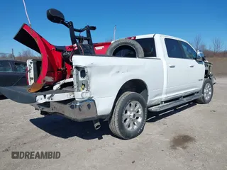 2023 Ram 2500 Laramie with VIN 3C6UR5FJ9PG530727, listed as a IAAI auction lot 41803946 with 19,992 mi miles and . Bid and sale history available at DreamBid. Image 4.