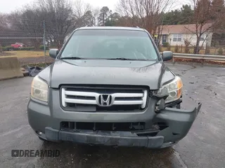 2007 Honda Pilot EX-L with VIN 5FNYF18677B033086, listed as a IAAI auction lot 41579680 with 280,246 mi miles and . Bid and sale history available at DreamBid. Image 12.