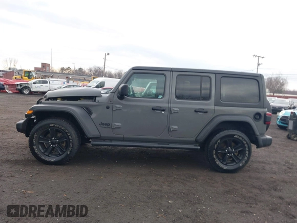 2021 Jeep Wrangler Unlimited Sport S with VIN 1C4HJXDG5MW614688, listed as a IAAI auction lot 41678964 with 89,309 mi miles. Bid and sale history available at carsss.com. Image 14.
