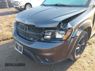 2019 Dodge Journey SE with VIN 3C4PDCBB2KT873970, listed as a IAAI auction lot 41864725 with 91,240 mi miles and . Bid and sale history available at DreamBid. Image 6.