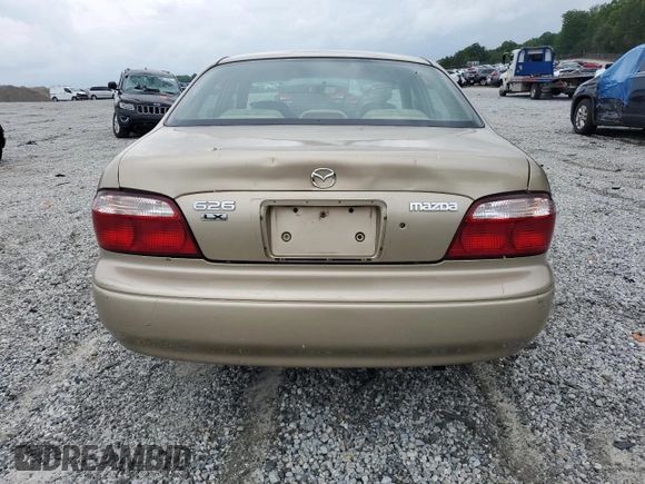 2001 Mazda 626 LX z VIN 1YVGF22C715202574, wystawiony jako Copart lot #54132915 z przebiegiem 237 041 mil mil oraz Szkoda całkowita • Salvage title. Historia ofert i sprzedaży dostępna na DreamBid. Obrazek 6.