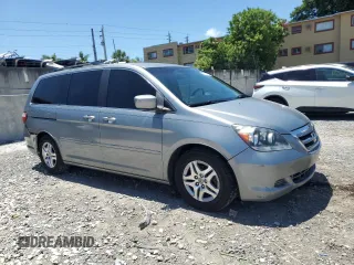 2007 Honda Odyssey EX z VIN 5FNRL38467B027951, wystawiony jako Copart lot #60109725 z przebiegiem 137 718 mil mil oraz Szkoda całkowita • Salvage title. Historia ofert i sprzedaży dostępna na DreamBid. Obrazek 4.