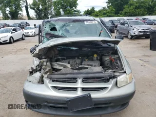 1999 Dodge Caravan with VIN 1B4GP45G7XB529075, listed as a Copart auction lot 60448215 with Not provided miles and Salvage title. Bid and sale history available at DreamBid. Image 5.