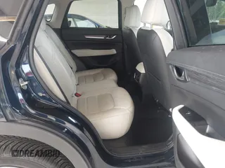 2019 Mazda CX-5 Grand Touring with VIN JM3KFBDM6K0522903, listed as a IAAI auction lot 42583005 with 61,174 mi miles and . Bid and sale history available at DreamBid. Image 8.