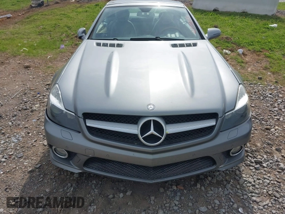 2011 Mercedes-Benz SL 550 z VIN WDBSK7BA9BF165156, wystawiony jako IAAI lot #42075223 z przebiegiem 41 313 mil mil oraz . Historia ofert i sprzedaży dostępna na DreamBid. Obrazek 12.