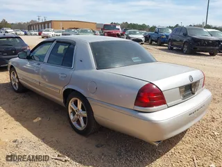 2004 Mercury Marauder with VIN 2MHHM79V74X675447, listed as a IAAI auction lot 41833704 with 244,849 mi miles. Bid and sale history available at carsss.com. Image 3.