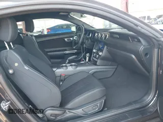 2022 Ford Mustang EcoBoost with VIN 1FA6P8TH9N5109501, listed as a IAAI auction lot 42437964 with 56,895 mi miles and . Bid and sale history available at DreamBid. Image 5.