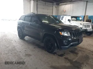 2015 Jeep Grand Cherokee Limited with VIN 1C4RJFBG4FC611156, listed as a IAAI auction lot 42021705 with 137,887 mi miles. Bid and sale history available at carsss.com. Image 1.