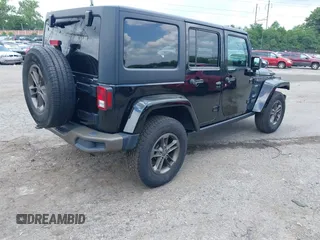2016 Jeep Wrangler Unlimited Sahara z VIN 1C4HJWEG3GL343340, wystawiony jako IAAI lot #42683859 z przebiegiem 92 878 mil mil oraz . Historia ofert i sprzedaży dostępna na DreamBid. Obrazek 4.