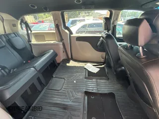2014 Dodge Grand Caravan SXT with VIN 2C4RDGCG1ER308403, listed as a Copart auction lot 56712885 with 131,847 mi miles and Clean Title. Bid and sale history available at DreamBid. Image 6.