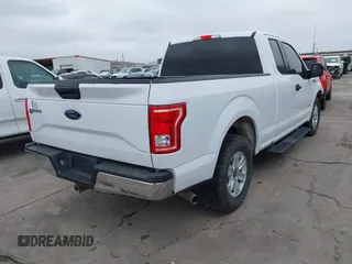 2017 Ford F-150 XL with VIN 1FTEX1CG5HKC87769, listed as a IAAI auction lot 41711952 with 147,486 mi miles. Bid and sale history available at carsss.com. Image 4.