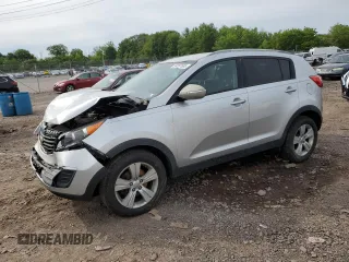 2012 Kia Sportage LX z VIN KNDPB3A29C7264856, wystawiony jako Copart lot #58397685 z przebiegiem 144 621 mil mil oraz Szkoda całkowita • Salvage title. Historia ofert i sprzedaży dostępna na DreamBid. Obrazek 1.