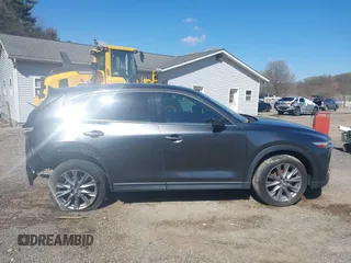 2020 Mazda CX-5 Grand Touring with VIN JM3KFBDM1L0821975, listed as a IAAI auction lot 40088794 with 68,895 mi miles and . Bid and sale history available at DreamBid. Image 14.