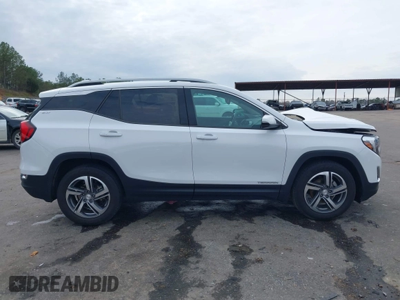 2021 GMC Terrain SLT z VIN 3GKALPEV7ML310653, wystawiony jako IAAI lot #41584058 z przebiegiem 86 069 mil mil oraz . Historia ofert i sprzedaży dostępna na DreamBid. Obrazek 13.