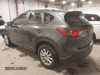 2015 Mazda CX-5 Touring with VIN JM3KE4CY3F0460501, listed as a IAAI auction lot 41889743 with 160,367 mi miles. Bid and sale history available at carsss.com. Image 3.