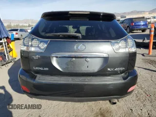 2007 Lexus RX 400h z VIN JTJGW31U172005381, wystawiony jako Copart lot #85118324 z przebiegiem 145 757 mil mil oraz Szkody całkowita. Historia ofert i sprzedaży dostępna na DreamBid. Obrazek 6.