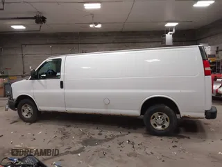 2012 Chevrolet Express Cargo Van with VIN 1GCWGGBA0C1100411, listed as a IAAI auction lot 41024219 with 197,251 mi miles. Bid and sale history available at carsss.com. Image 13.