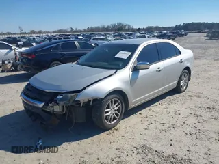 2011 Ford Fusion S with VIN 3FAHP0GA3BR311556, listed as a IAAI auction lot 41668511 with 200,159 mi miles. Bid and sale history available at carsss.com. Image 2.