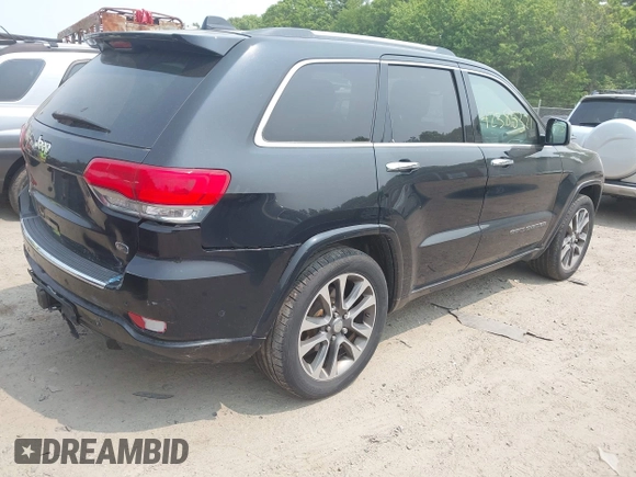 2017 Jeep Grand Cherokee Overland z VIN 1C4RJFCG4HC632929, wystawiony jako IAAI lot #42385321 z przebiegiem 205 593 mil mil oraz . Historia ofert i sprzedaży dostępna na DreamBid. Obrazek 6.