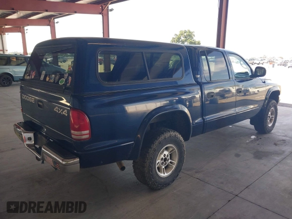 2000 Dodge Dakota Sport with VIN 1B7GG2AN7YS647799, listed as a IAAI auction lot 42147404 with 234,194 mi miles and . Bid and sale history available at carsss.com. Image 4.