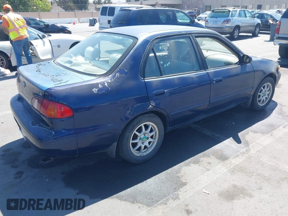 1998 Toyota Corolla VE z VIN 2T1BR18E4WC099280, wystawiony jako IAAI lot #42624278 z przebiegiem 129 901 mil mil oraz . Historia ofert i sprzedaży dostępna na DreamBid. Obrazek 4.
