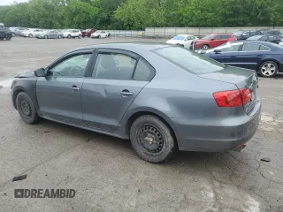 2013 Volkswagen Jetta S with VIN 3VW2K7AJ4DM318853, listed as a Copart auction lot 57597955 with 165,023 mi miles and Salvage title. Bid and sale history available at DreamBid. Image 2.