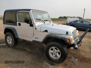 2003 Jeep Wrangler Sport z VIN 1J4FA49S93P306817, wystawiony jako Copart lot #60136385 z przebiegiem 217 208 mil mil oraz Czysty tytuł • Clean title. Historia ofert i sprzedaży dostępna na DreamBid. Obrazek 4.