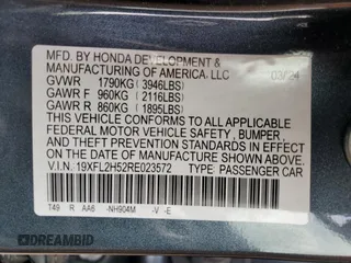 2024 Honda Civic LX с VIN 19XFL2H52RE023572, выставлен на аукционе Copart как лот 55791845 с пробегом 12 632 миль миль и Списание • Salvage title. История ставок и продаж доступна на DreamBid. Изображение 13.
