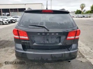 2013 Dodge Journey SE z VIN 3C4PDCAB7DT597063, wystawiony jako Copart lot #55896734 z przebiegiem 140 847 mil mil oraz Czysty tytuł • Clean title. Historia ofert i sprzedaży dostępna na DreamBid. Obrazek 6.