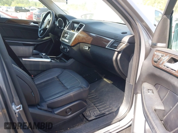 2014 Mercedes-Benz GL 450 with VIN 4JGDF7CE0EA290673, listed as a IAAI auction lot 42207889 with 132,251 mi miles and . Bid and sale history available at DreamBid. Image 5.