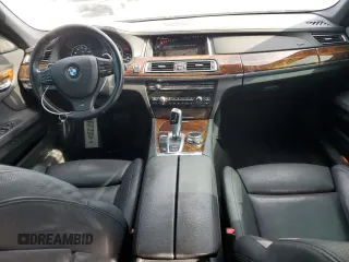 2014 BMW 7 Series 740Li with VIN WBAYE4C52ED138770, listed as a Copart auction lot 53647665 with 106,827 mi miles and Salvage title. Bid and sale history available at DreamBid. Image 8.