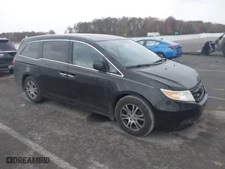 2013 Honda Odyssey EX-L with VIN 5FNRL5H69DB004088, listed as a IAAI auction lot 40742214 with 200,245 mi miles. Bid and sale history available at carsss.com. Image 1.