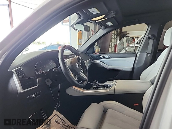 2023 BMW X5 xDrive40i with VIN 5UXCR6C00P9R65110, listed as a IAAI auction lot 42635441 with 32,227 mi miles and . Bid and sale history available at DreamBid. Image 3.