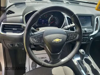 2021 Chevrolet Equinox LT z VIN 3GNAXJEV9ML393765, wystawiony jako IAAI lot #42561470 z przebiegiem 68 765 mil mil oraz . Historia ofert i sprzedaży dostępna na DreamBid. Obrazek 9.