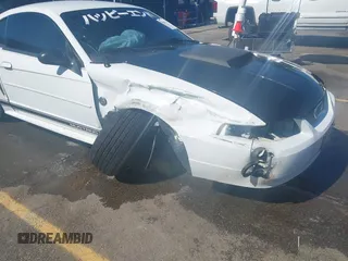 2004 Ford Mustang Standard z VIN 1FAFP40654F229283, wystawiony jako IAAI lot #42309648 z przebiegiem 164 610 mil mil oraz . Historia ofert i sprzedaży dostępna na DreamBid. Obrazek 6.