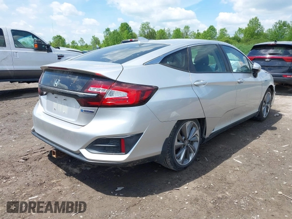 2018 Honda Clarity z VIN JHMZC5F14JC007026, wystawiony jako IAAI lot #42361556 z przebiegiem 74 132 mil mil oraz . Historia ofert i sprzedaży dostępna na DreamBid. Obrazek 4.