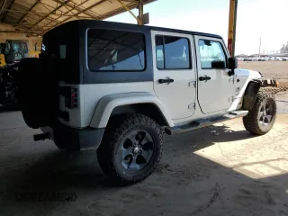 2018 Jeep Wrangler JK Unlimited Sahara with VIN 1C4HJWEG8JL938031, listed as a Copart auction lot 69769394 with 80,417 mi miles and Salvage Title. Bid and sale history available at carsss.com. Image 3.