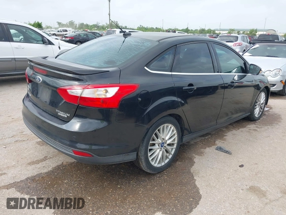 2013 Ford Focus Titanium with VIN 1FADP3J23DL152122, listed as a IAAI auction lot 41935180 with 175,065 mi miles and . Bid and sale history available at carsss.com. Image 4.