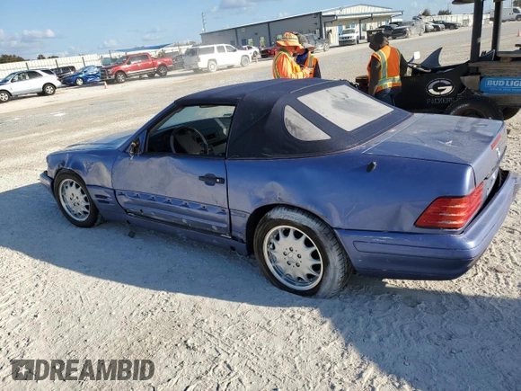 1997 Mercedes-Benz SL 500 z VIN WDBFA63F1VF152883, wystawiony jako Copart lot #77570524 z przebiegiem Nie podano mil oraz Szkoda całkowita • Salvage title. Historia ofert i sprzedaży dostępna na DreamBid. Obrazek 2.