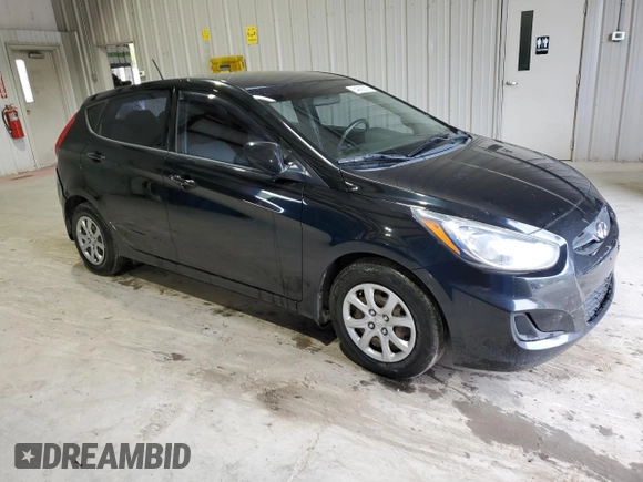 2014 Hyundai Accent GS with VIN KMHCT5AE7EU183520, listed as a Copart auction lot 54299215 with 92,660 mi miles and Salvage title. Bid and sale history available at DreamBid. Image 4.