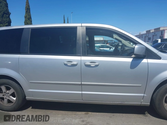 2012 Dodge Grand Caravan SXT with VIN 2C4RDGCG7CR204835, listed as a IAAI auction lot 41948688 with 125,466 mi miles and . Bid and sale history available at DreamBid. Image 13.