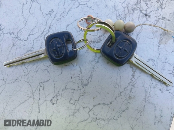 2006 Scion xB z VIN JTLKT324764044312, wystawiony jako IAAI lot #42183613 z przebiegiem 249 038 mil mil oraz . Historia ofert i sprzedaży dostępna na DreamBid. Obrazek 11.