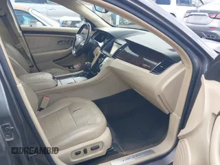 2013 Ford Taurus Limited z VIN 1FAHP2F88DG195677, wystawiony jako IAAI lot #42476918 z przebiegiem 197 732 mil mil oraz . Historia ofert i sprzedaży dostępna na DreamBid. Obrazek 5.