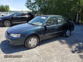 1999 Toyota Corolla VE with VIN 1NXBR12E7XZ240321, listed as a Copart auction lot 64259115 with 144,145 mi miles and Salvage title. Bid and sale history available at DreamBid. Image 1.