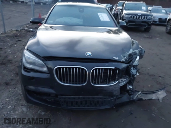 2015 BMW 7 Series 740Li xDrive with VIN WBAYF4C51FGS99074, listed as a IAAI auction lot 41222498 with 132,789 mi miles. Bid and sale history available at carsss.com. Image 6.